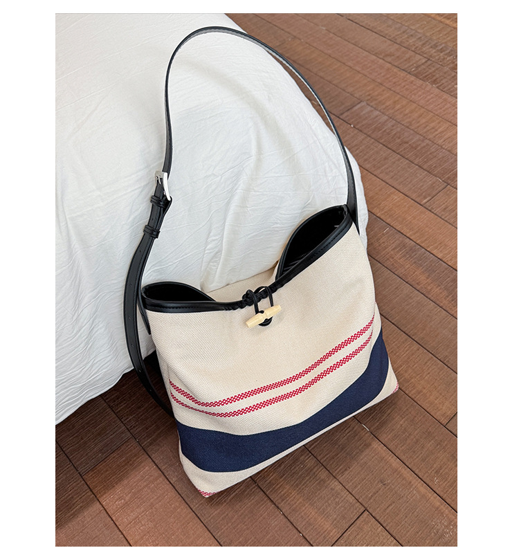 Korean version large-capacity women's 2025 new style fashionable canvas striped single-shoulder underarm bag casual commuting tote bag undefined