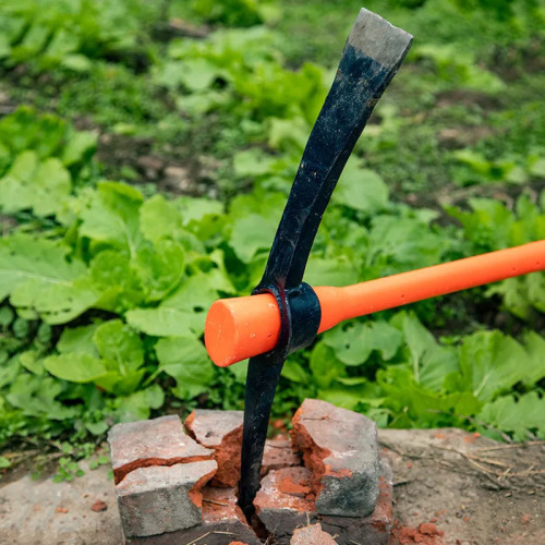 Forged pickaxe with integrated flat tip and double-ended design—thick, sturdy cross-head pick for construction, rescue operations, and agricultural use.