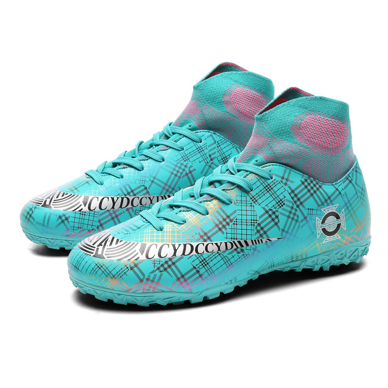 Venta al por mayor zapatos de fútbol resistente al desgaste transpirable Pato Mandarín color alto-top antideslizante Plaid casual corto clavo hierba juventud entrenamiento zapatos