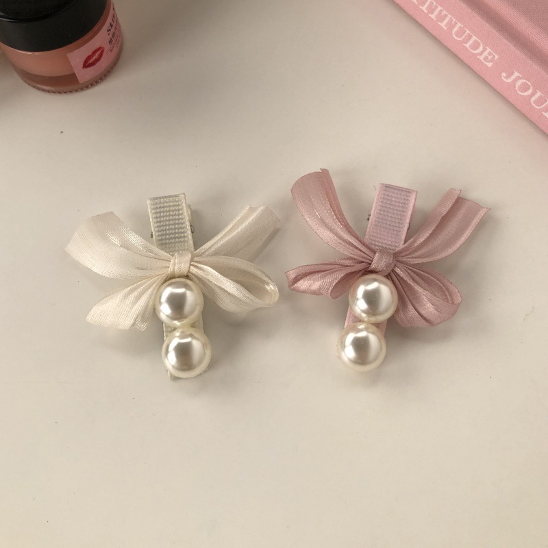 Fuchsia hairgrip with bow