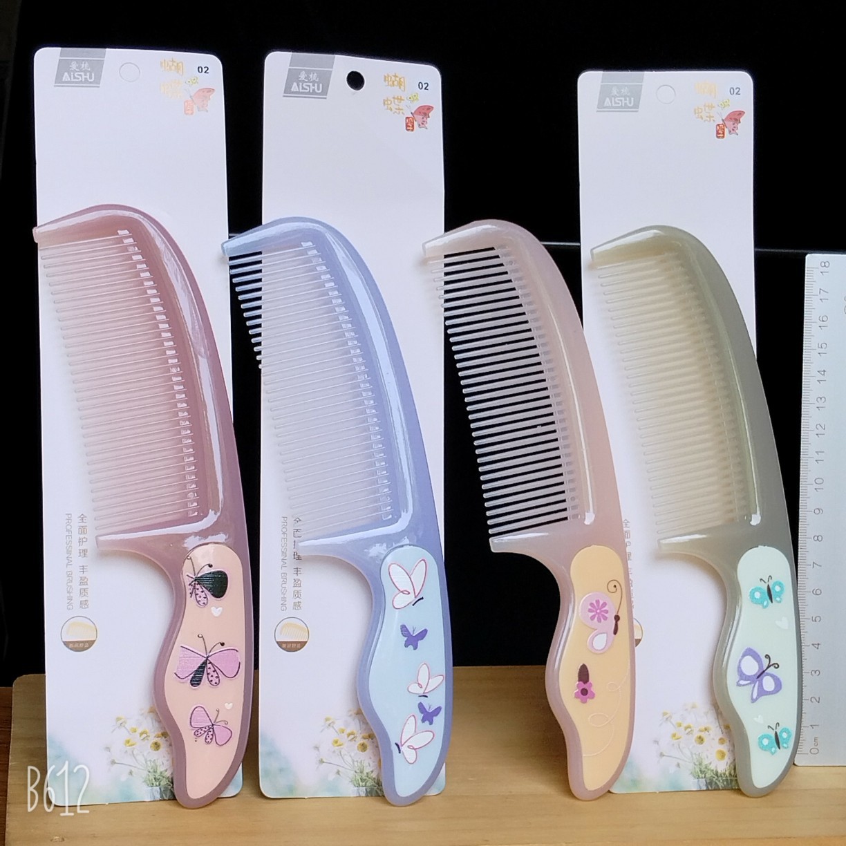 Bonito peine de peinado color macarrón con cojín de aire para masaje, adecuado para uso doméstico y dormitorios estudiantiles, cepillo de pelo de plástico suave con cojín de aire.