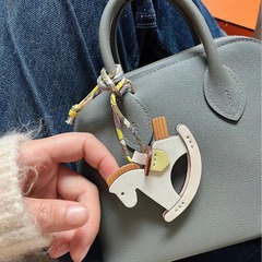 2024新款真皮搖搖小木馬包包掛件創意可愛汽車後視鏡掛飾鑰匙扣潮