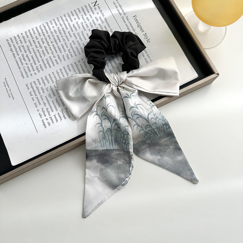 Anillo de cabello de arco femenino retro elegante correa francesa temperamento de alta sensación de impresión de anillo de intestino suave tocado versátil