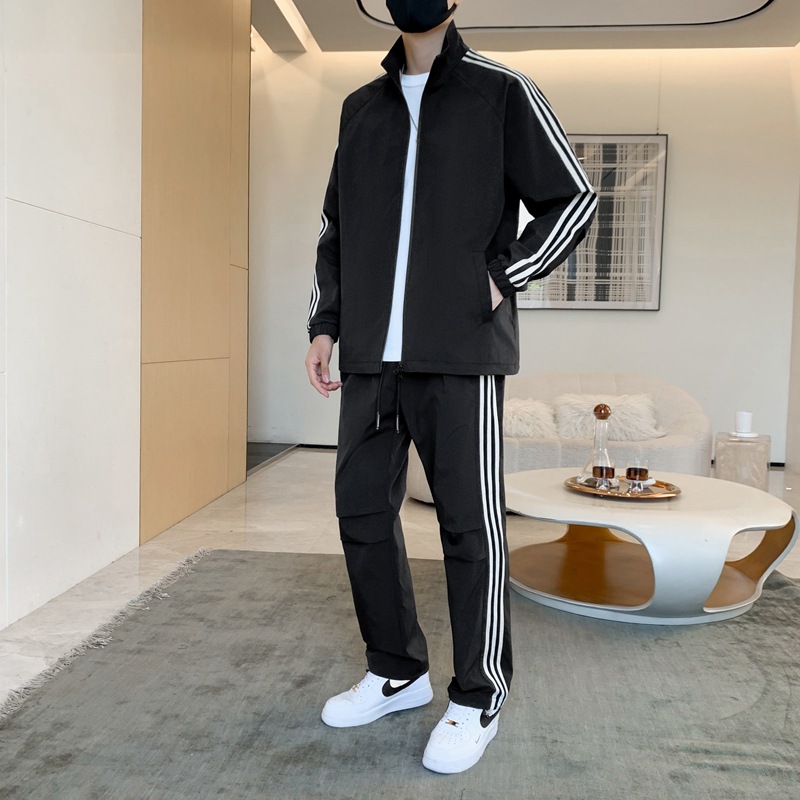 Primavera y otoño transfronterizos chaqueta delgada ropa deportiva hombre ocio tres barras juego de deporte de correr al aire libre dos piezas juego de comercio exterior