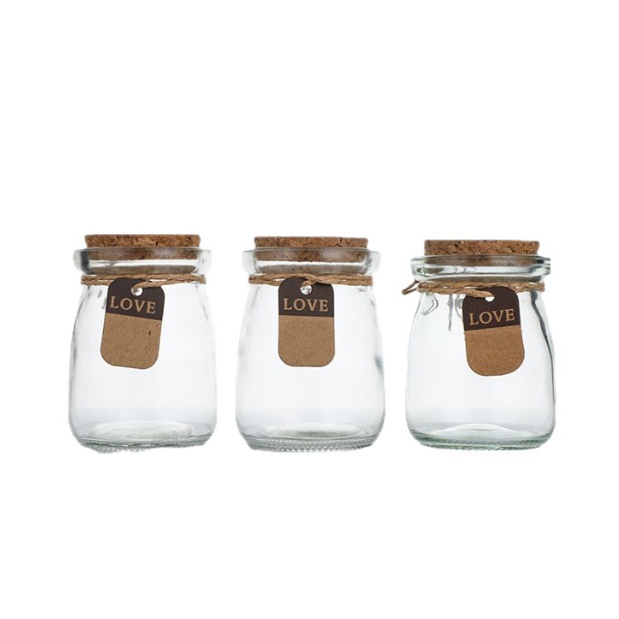 Venta al por mayor botella de pudín de vidrio de 100ml taza de leche gruesa botella de yogur resistente a altas temperaturas botella de vidrio de corcho