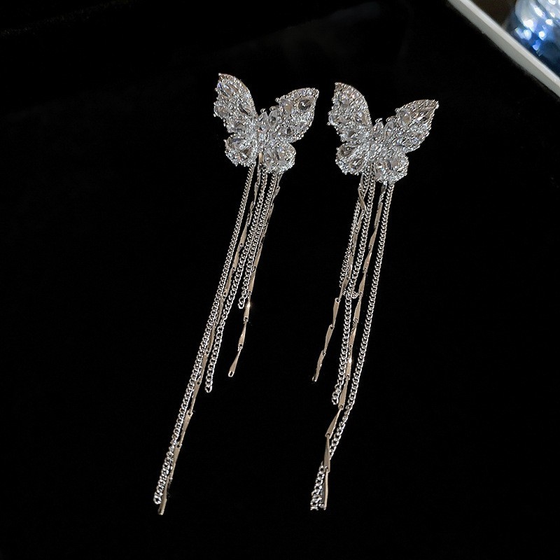 Pendientes de borla de hojas de diamantes súper parpadeantes de plata Pendientes de temperamento de moda Pendientes de diseño de nicho femenino Lujo ligero y de alta gama