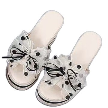 2026 primavera y verano arco de diamante de agua de fondo suave pequeños niños en casa para salir a aumentar la altura de la pendiente de fondo grueso zapatillas de tacón