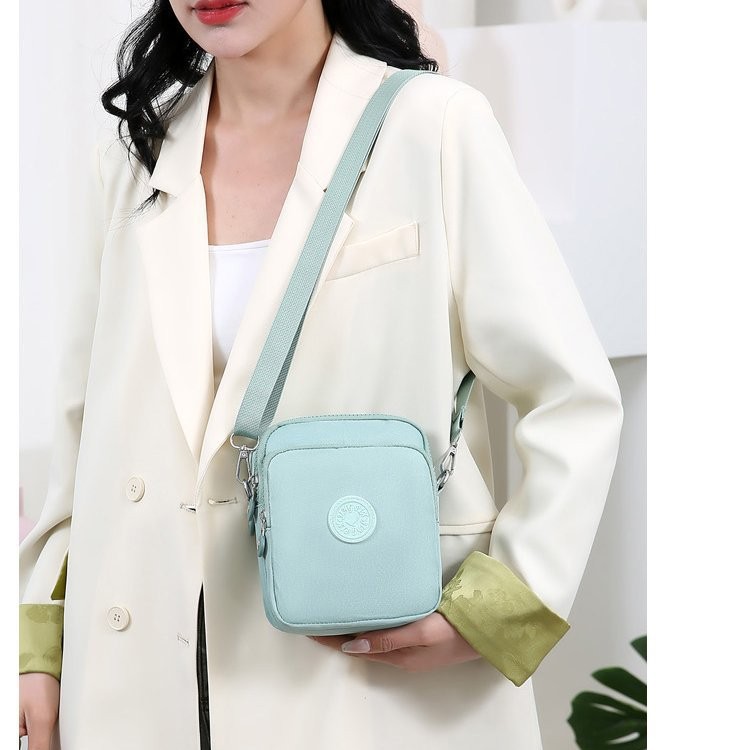 Bolso bandolera ligero bolso femenino 2024 nuevo estilo tela Oxford bolso cuadrado pequeño multicapa bolso pequeño de hombro para mujer textura versátil