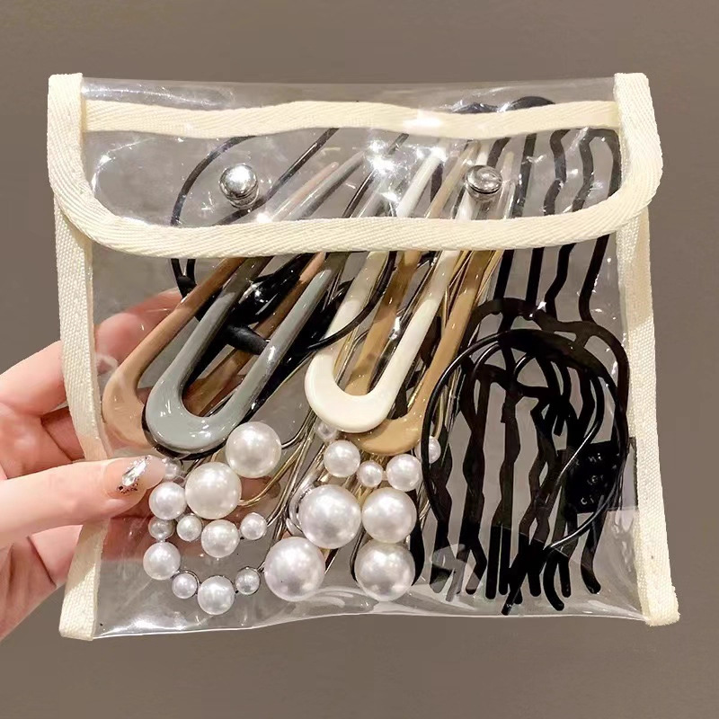 Perla de alta sensación en forma de U abrazadera de cabello bola de cabello fija abrazadera de cabello nuevo peine de cuatro dientes joyas al por mayor