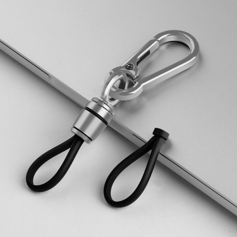 Llavero de los Hombres Nuevo llavero de coche metal 2023 simple llavero adornos de alta gama anti-perdido cuerda de cuero Doble