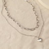 Fashionable retro jewelry, necklace heart-shaped, simple and elegant design, bright catchy style