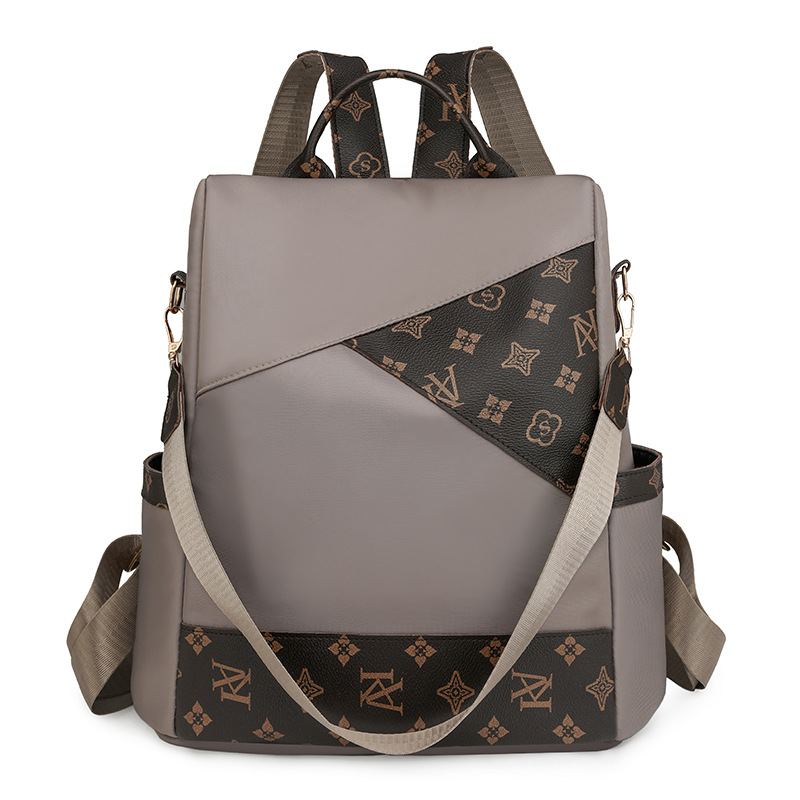 Comercio exterior al por mayor 2024 nueva mochila antirrobo de nailon para mujer retro, mochila multifuncional de doble uso de color de contraste de moda
