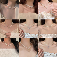 レトロパールネックレス、ライトラグジュアリー、文学的で芸術的なニッチデザイン、ハイエンドダイヤモンドペンダント、鎖骨チェーン、ハイエンドネックレス卸売