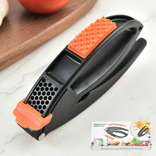 Factory direct spot plastic multi-function three-in-one garlic press garlic paste household fruit peeler meat Press