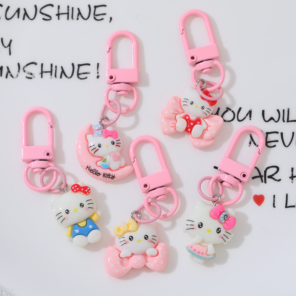 Cartoon Moon Cat DIY accesorios de resina llaveros Sanrio arco gato bolsas colgantes de chicas