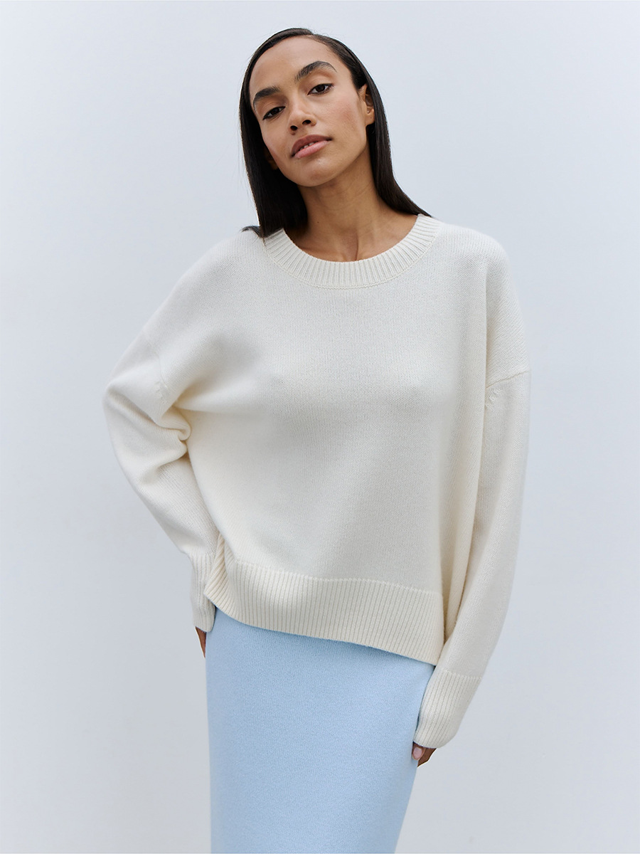 Suéter de manga larga de cuello redondo transfronterizo para mujeres Europa y los Estados Unidos 2025, otoño y invierno nuevo estilo simple camisa de punto de color sólido suéter suelto