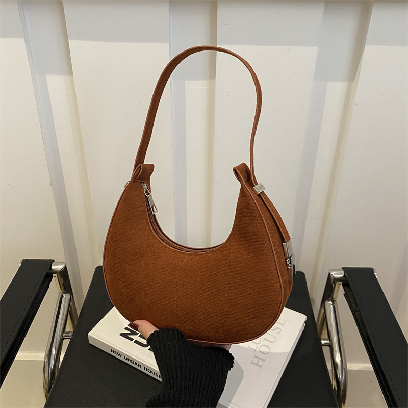 Bolsa de media luna francesa nicho para mujeres 2025 verano nuevo estilo de moda de color sólido esmerilado textura de moda bolso de hombro bolso debajo de la axila