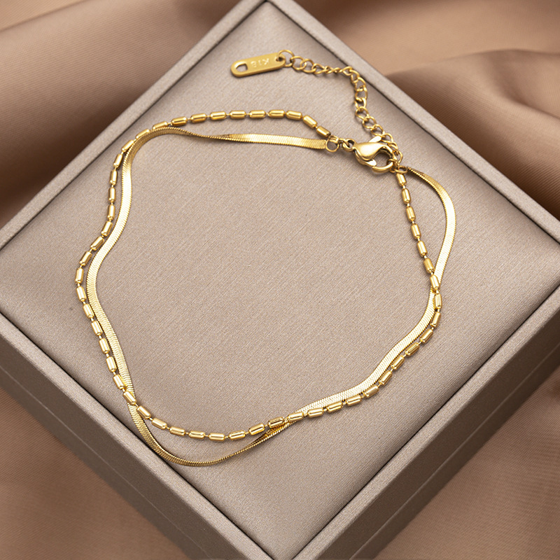 Wenjian caliente europeo y americano Venta caliente titanio acero tobillera luz lujo nicho romántico al por mayor serpiente hueso cadena bar moda al por mayor chapado en oro