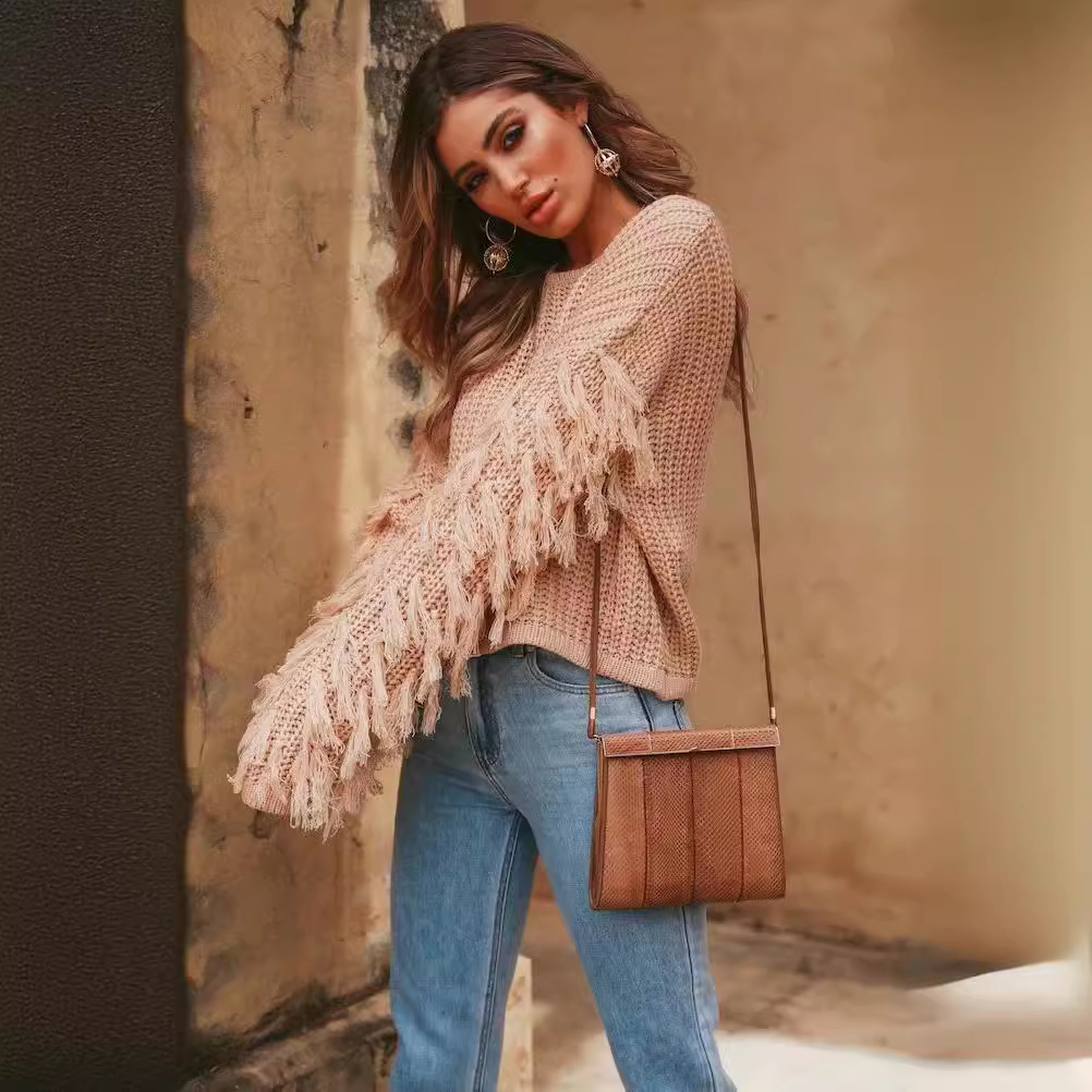 AliExpress eBay ropa de mujer de comercio exterior popular suéter suelto de Europa y América sexy manga borla suéter de manga larga para las mujeres