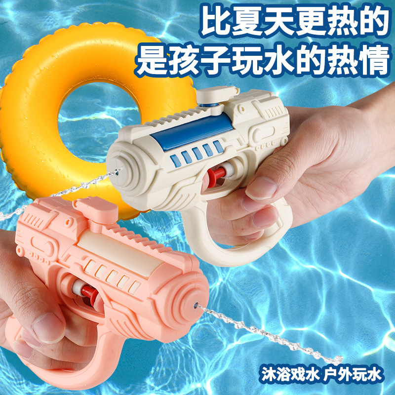 Nuevo juguete de pistola de agua para niños Juego de playa de verano botón al por mayor lindo color caramelo pequeña pistola de agua salpicaduras de agua Festival