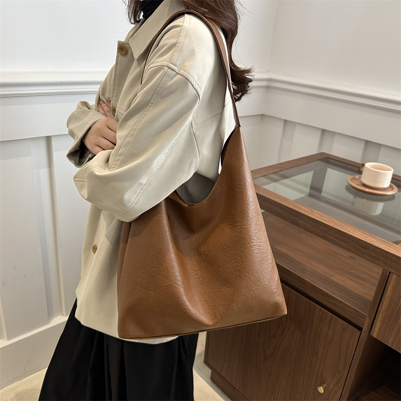 2024 color sólido nuevo estilo simple ocio de viaje axilar de hombro bolso de dos piezas conjunto de otoño y invierno gran capacidad retro