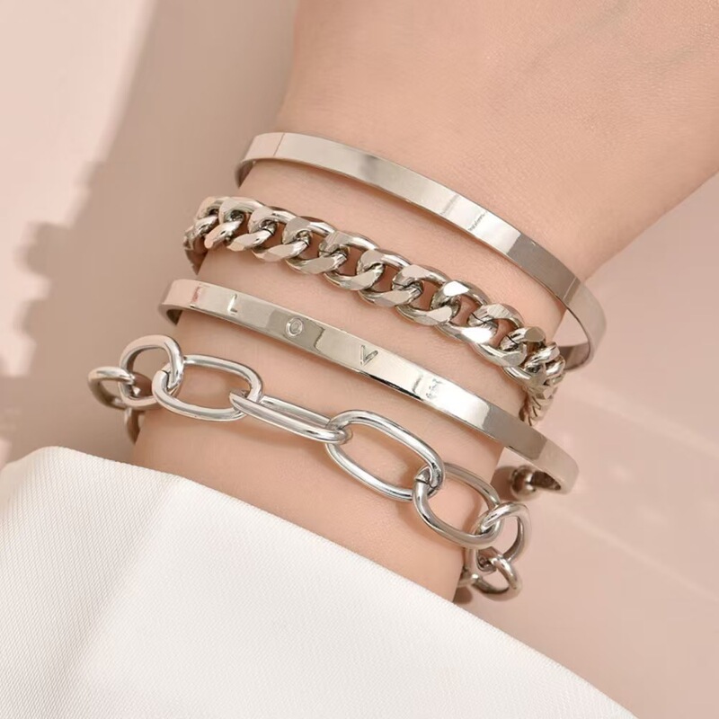 Europe and the United States new four-piece chain bracelet fashion mix and match bracelet hollow jewelry stacked wind combination suit wholesale Europe and the United States new four-piece chain bracelet fashion mix and match bracelet hollow jewelry stacked wind combination suit wholesale