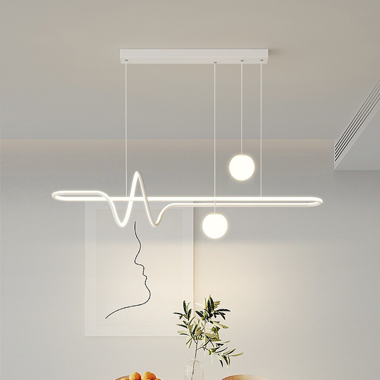 Nordic-style minimalist modern simple creative designer's dining room pendant light, long bar table and bar counter one-word lamp