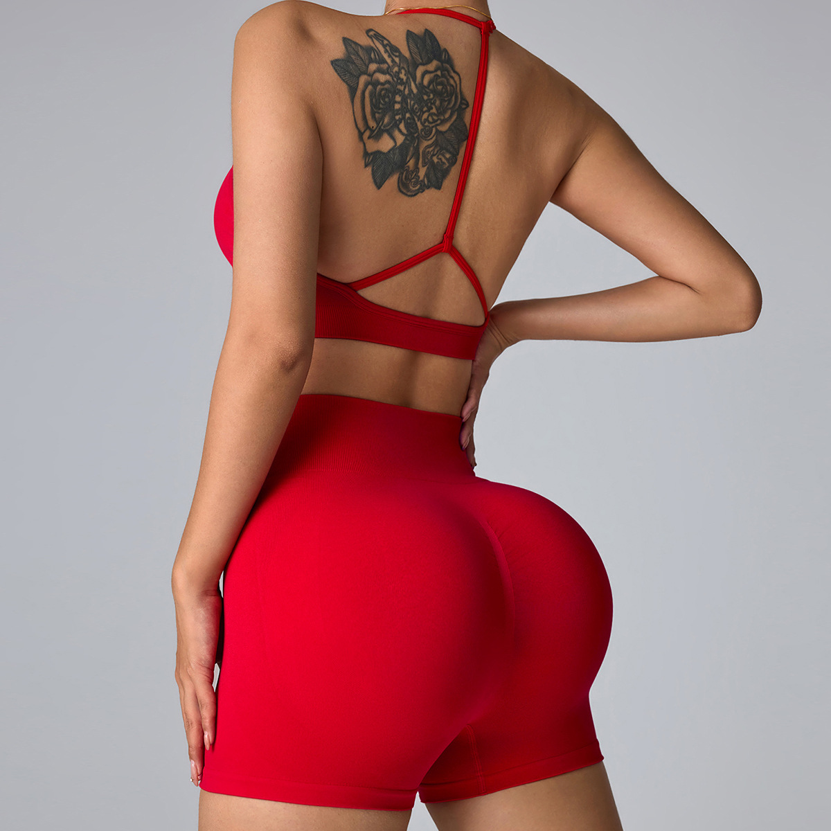 Traje de ropa de yoga de fitness sin costura europea y americana, sujetador deportivo con cuello halter, hermosa espalda, melocotón, cadera, caderas, pantalones cortos de yoga de cintura alta