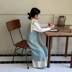 子供のスカート秋 2025 女の赤ちゃん韓国語版無地中空ベストスカート子供の不規則なブラウススカート Mo Xiaomeng