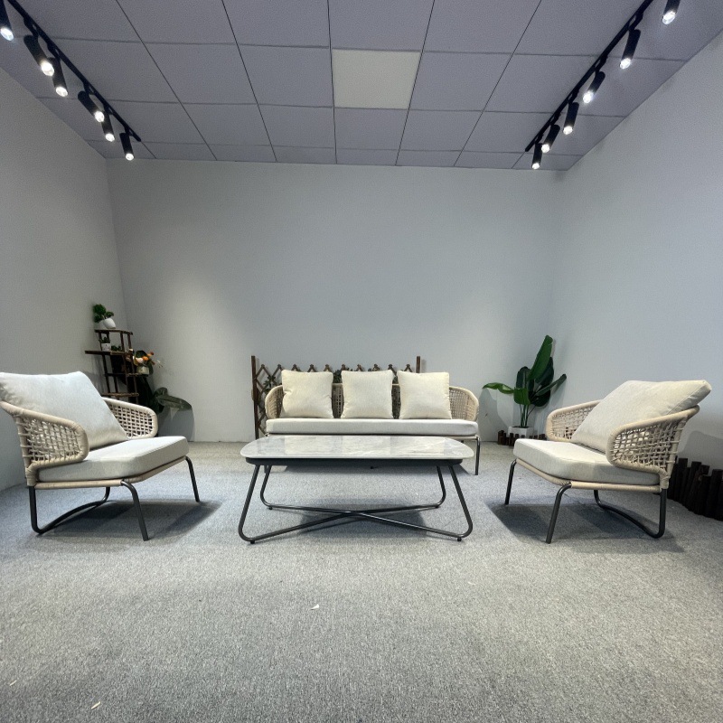Sofá al aire libre tela de caña muebles de patio balcón mesas y sillas combinación diseñador tela de cuerda al aire libre silla de caña casual tres piezas set