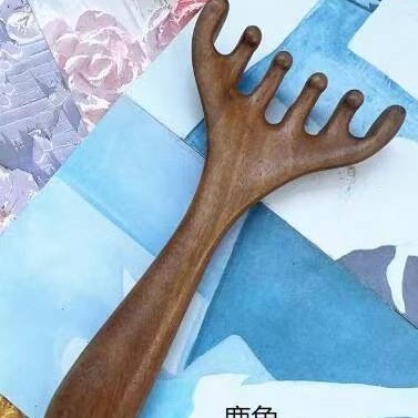 卸売り鹿の角の頭部の経絡のマッサージ器のマッサージ器の櫛は頭をつかんで治療します。|undefined