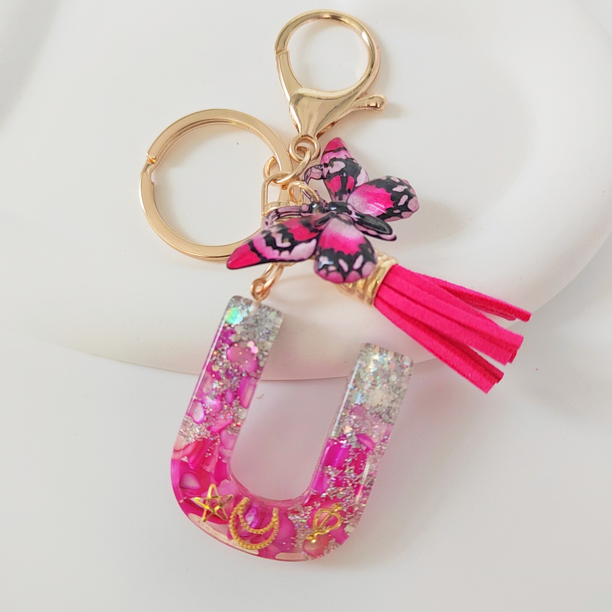 Inventario transfronterizo nueva resina bicolor mariposa borda llavero colgante estrella luna accesorios de joyas