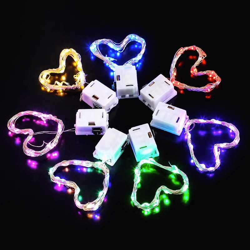 LED botón batería pequeña caja blanca flores de colores luces de cadena al por mayor árbol de Navidad decoración de alambre de cobre atmósfera luces de cadena
