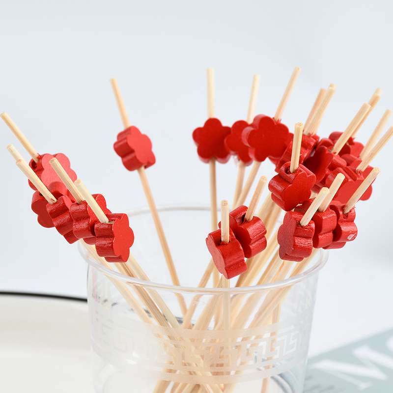 Fábrica de suministro desechable flores rojas horquilla de fruta palillos de dientes de dibujos animados palillos de frutas palillos de dientes artísticos palillos de bambú