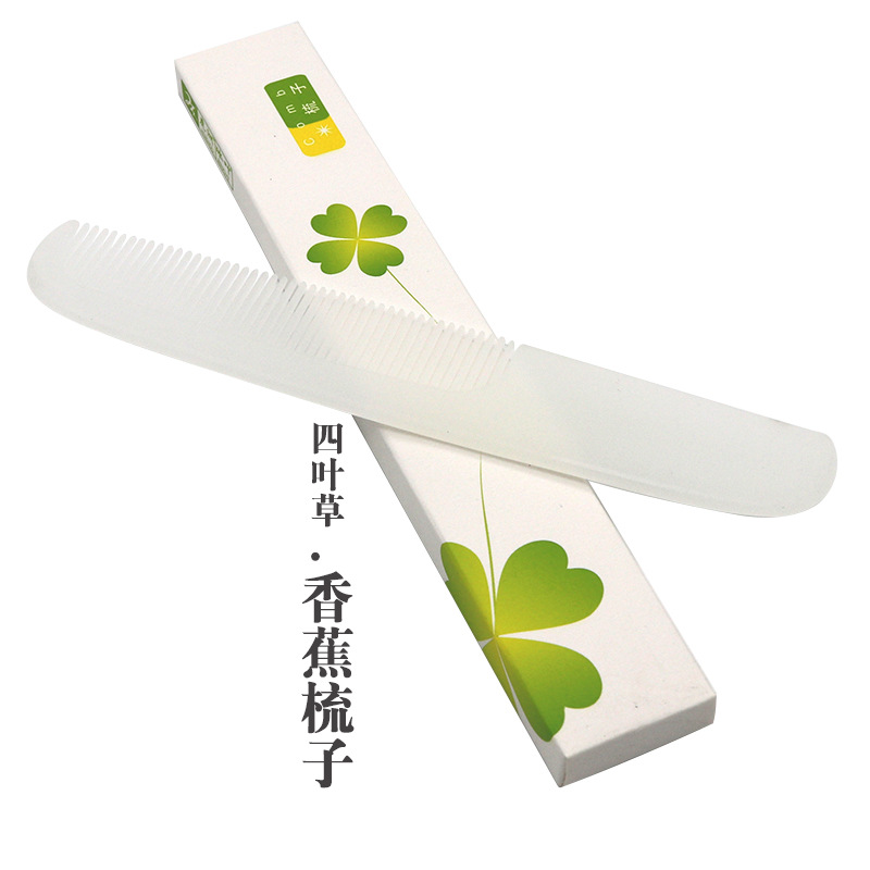 四叶草白底梳子4