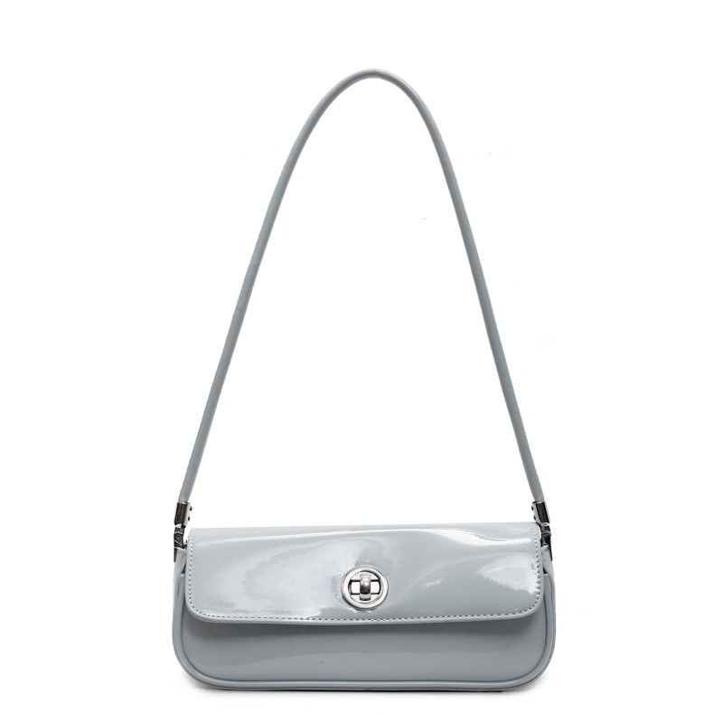 Bolso de axila de textura de alta calidad 2025 primavera nuevo bolso femenino charol brillante bolso de hombro fresco simple