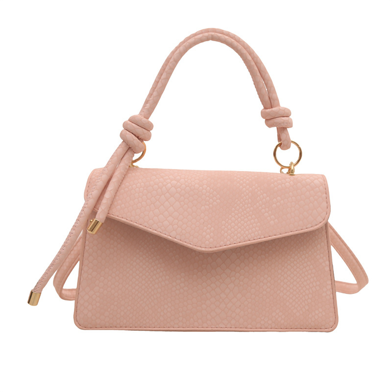 Bolso con estampado de piel de serpiente de diseño de nicho de lujo ligero transfronterizo para mujer 2025 nuevo bolso de mensajero de un solo hombro