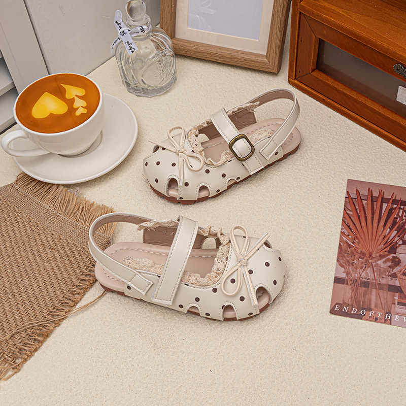 Niñas sandalias de verano 2026 nuevo estilo de moda infantil zapatos de princesa universal arco de encaje zapatos de moda Lefour