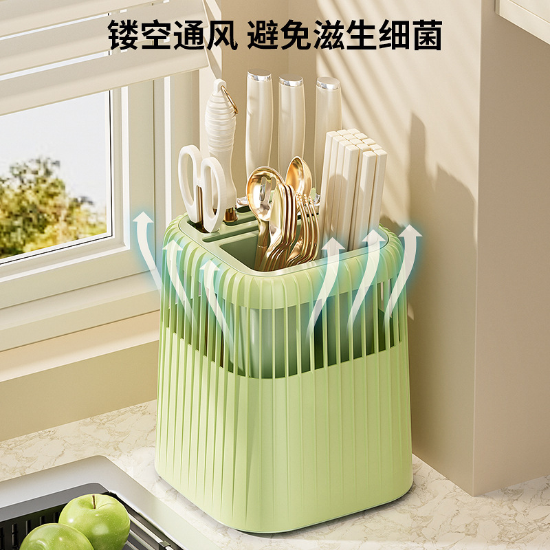 La encimera del cuchillo giratorio multifuncional se divide en celdas para drenar el estante de la cocina doméstica, los utensilios de cocina contienen cajas, palillos y cuchillos.