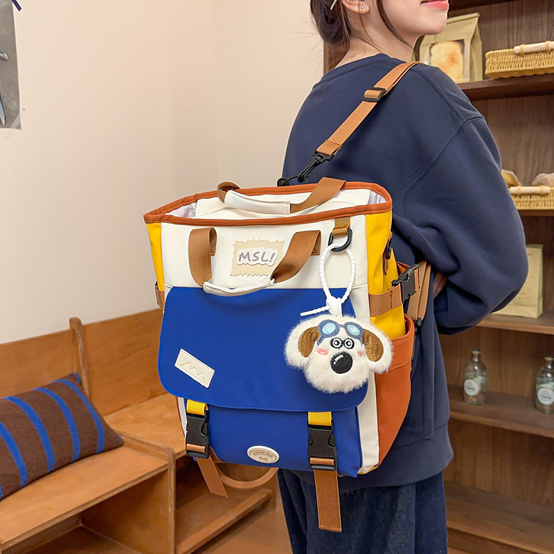 新商品の学院風のリュックサックの男女大衆のデザイン感は色の学生のかばんの潮流にぶつかります。|undefined