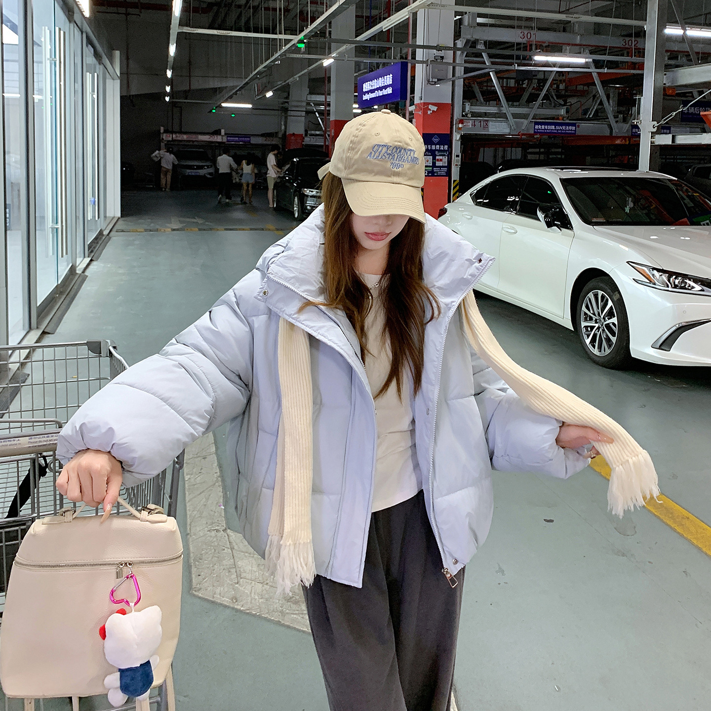 Ropa de algodón de mujer 2025 ropa de pan de invierno nueva chaqueta de algodón con capuchón multifuncional gruesa abrigo de algodón caliente de mujer abrigo corto
