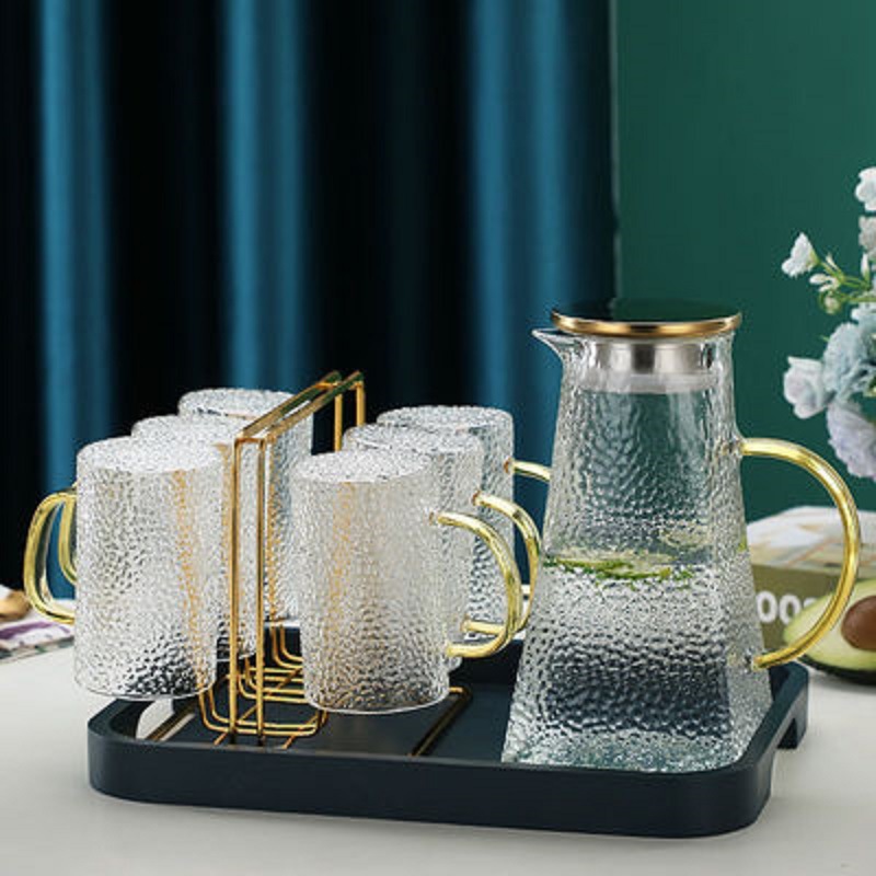 Fábrica al por mayor vidrio martillado botella de agua fría material de vidrio de borosilicato botella de agua fría hogar cuadrado jugo olla