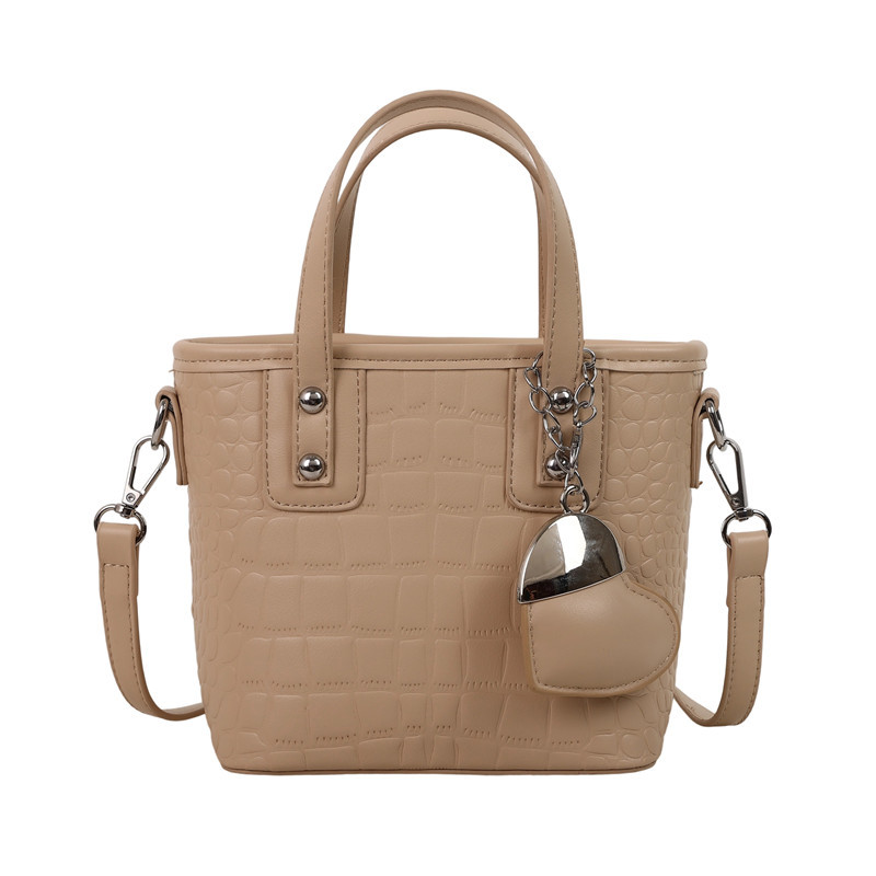 Bolso de alta calidad con textura 2025 verano nuevo estilo bolso de hombro con patrón de cocodrilo moda amor bolso de mensajero mujer