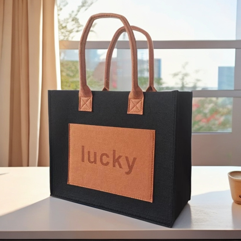 Spot fieltro bolso de gran capacidad celebridad de Internet simple viaje a juego de color portátil pequeño libro rojo bolso de fieltro de un solo hombro