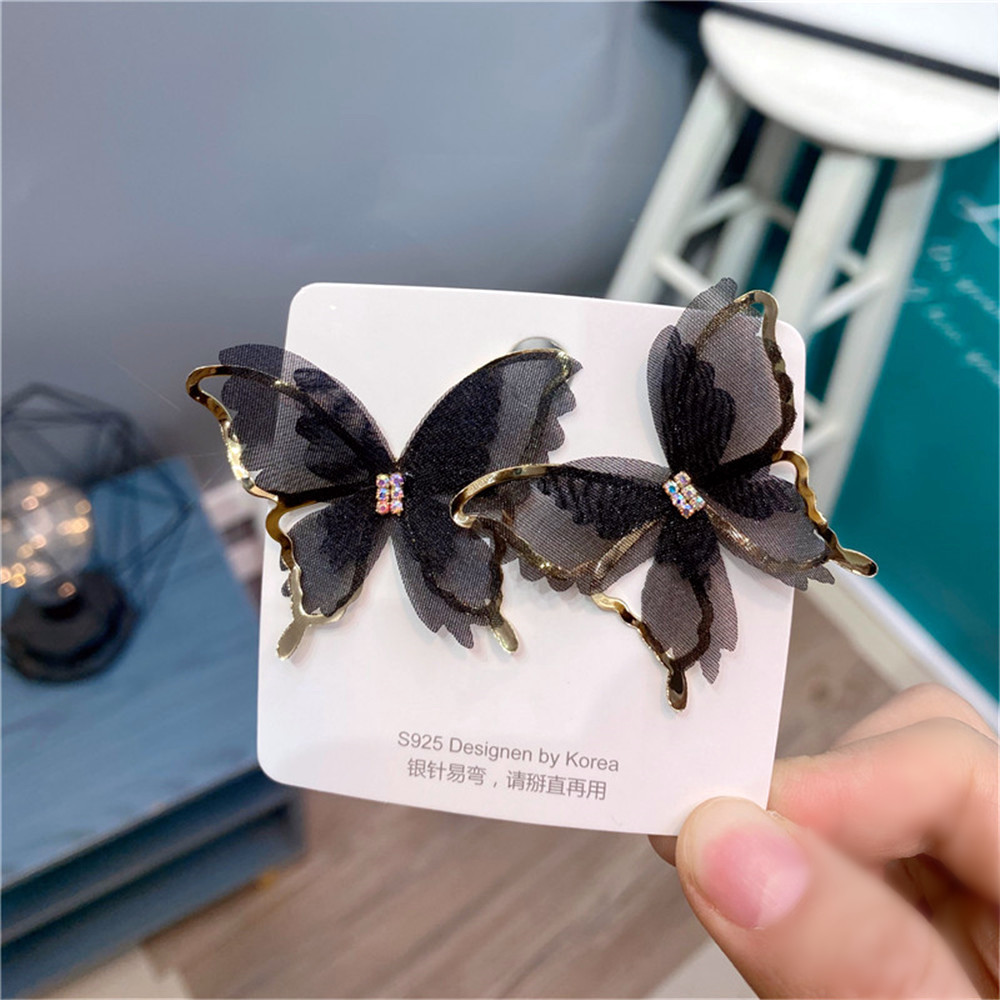 Fashion Hollow Butterfly Diamond-studded Earrings display picture 1