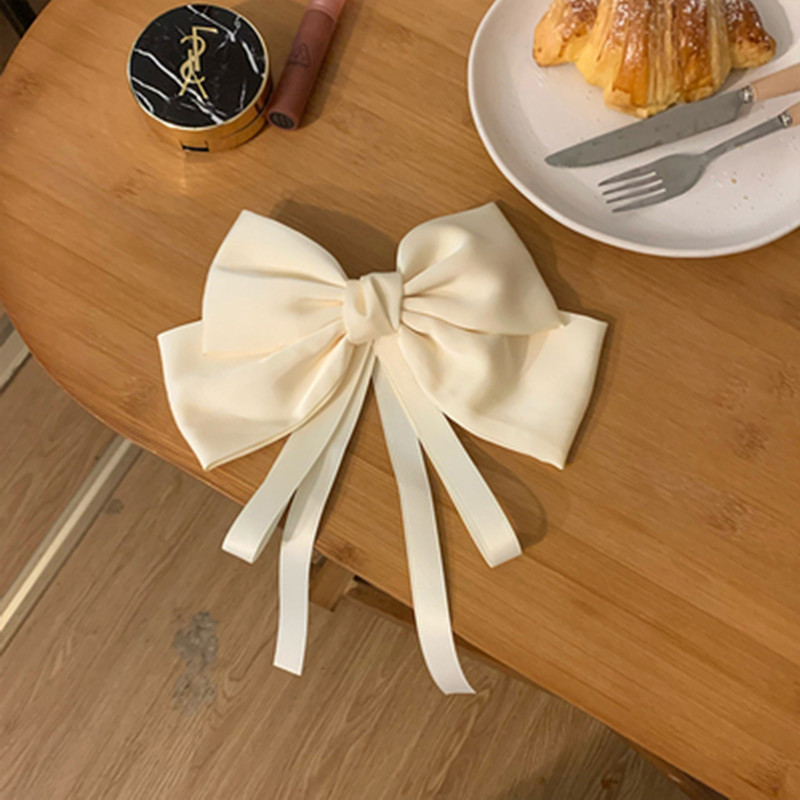 White thin ribbon big bow