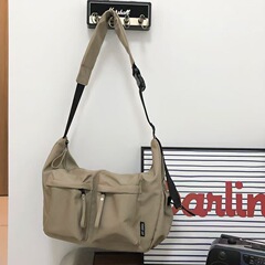 高颜値ナイロン布ギョーザバッグ斜めショルダーバッグ男女同型カジュアルスポーツ風シングルショルダーバッグ