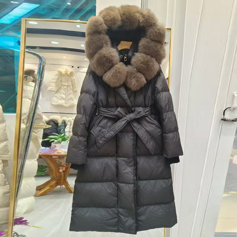 유럽 스타일 2025 겨울 신상 여우털 큰 칼라 다운 재킷 여성용 중간 길이 무릎 아래 두꺼운 끈 조임형 코트