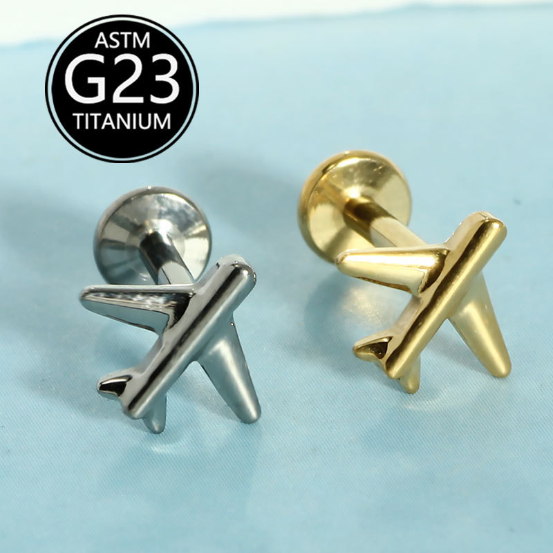 Silver pointed spike labret stud material detail