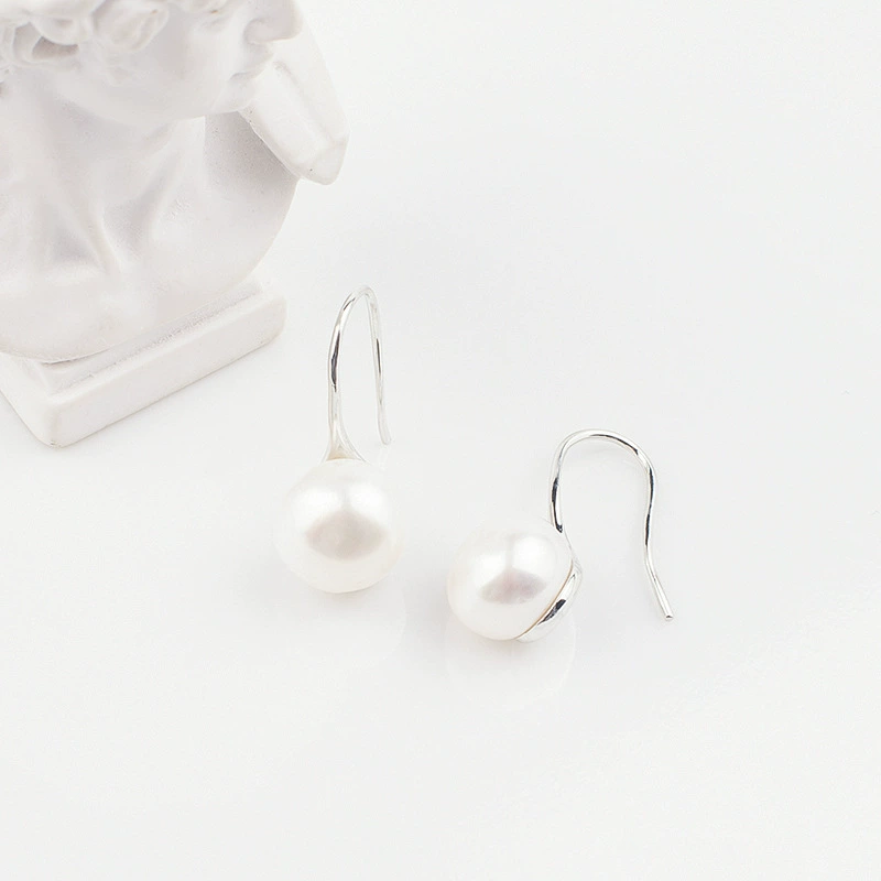 Organic retro earrings from pearl, mosquito coil, ear clips, pearl silver, light luxury style, french style, high-quality style, bright catchy style, wholesale